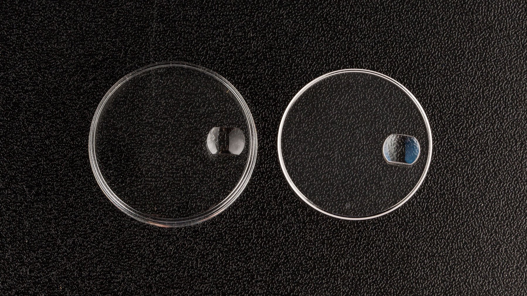changes between the acrylic crystal on the left versus the sapphire crystal on the right