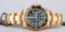 Rolex GMT Master II Ceramic Gold Green Dial