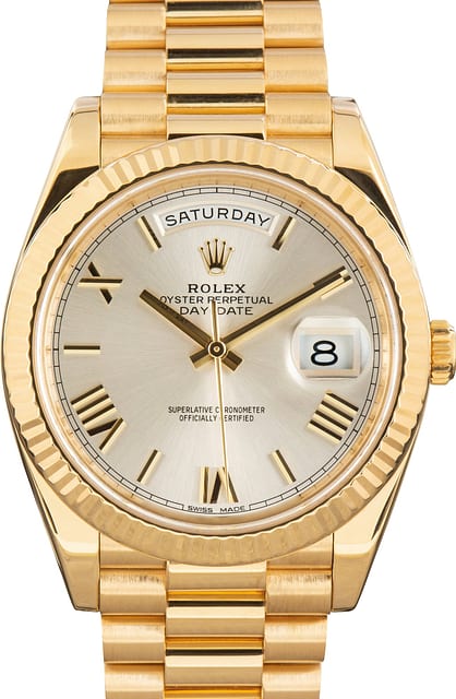 Pre-Owned Rolex Day-Date 40 Silver Roman Dial 228238 18k Yellow Gold