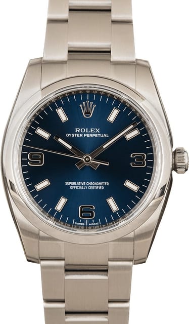 Unworn Rolex Oyster Perpetual 114200 Blue Index Dial
