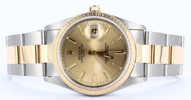 Rolex Oyster Perpetual Date 15223 Champagne