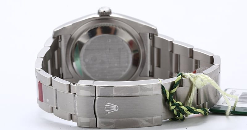 Unworn Rolex Oyster Perpetual 116000 Silver Dial