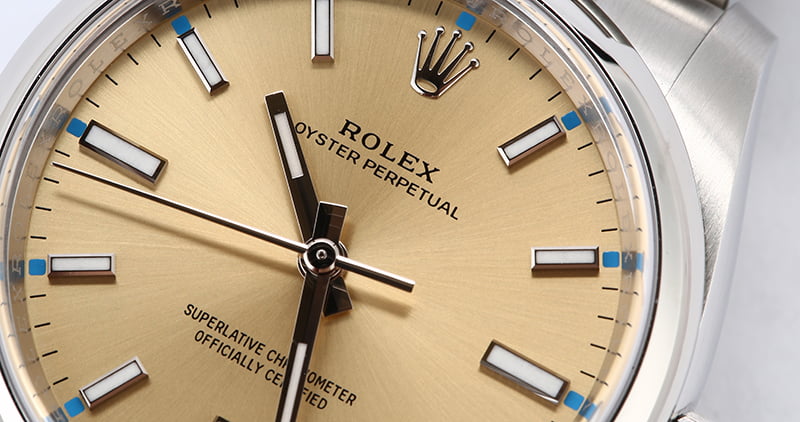 Rolex Oyster Perpetual 114200 Champagne Dial