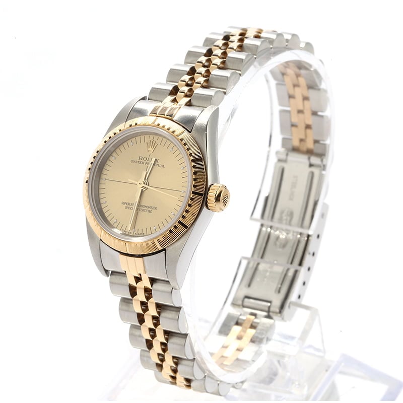 Rolex Oyster Perpetual 76243 Champagne Quadrant Dial