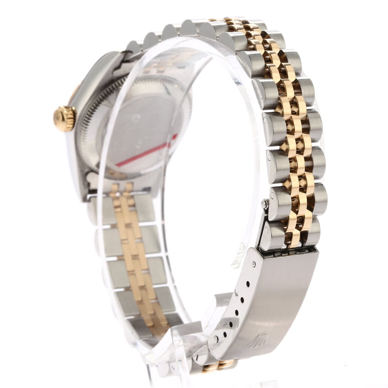 Rolex Oyster Perpetual 76243 Champagne Quadrant Dial