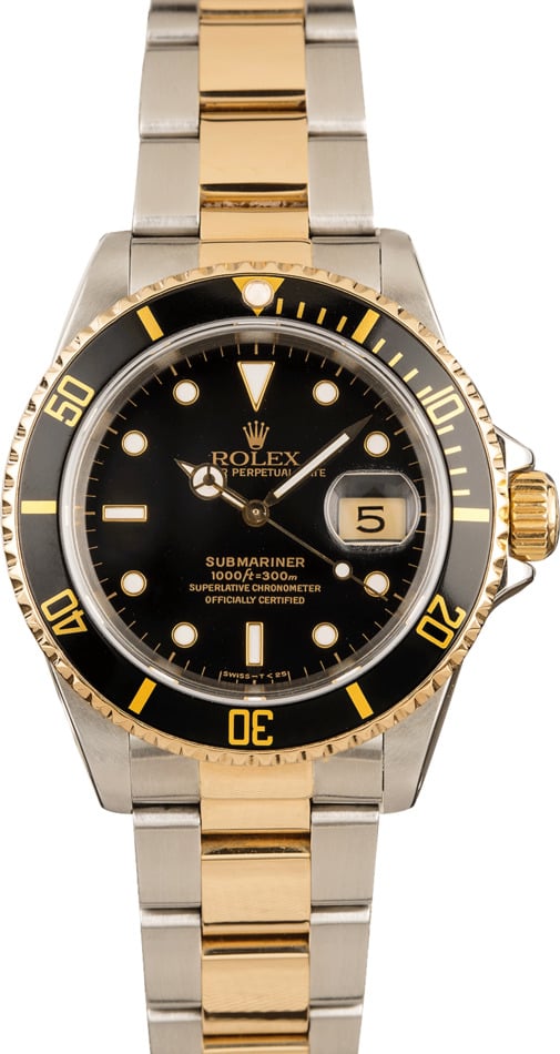 black face rolex gold