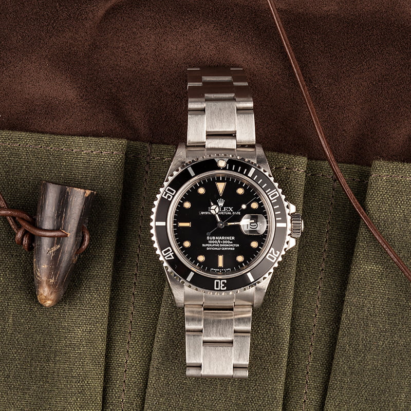 Pre-Owned 40MM Rolex Submariner 168000 Black Dial