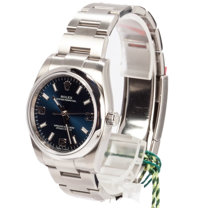 Unworn Rolex Oyster Perpetual 114200 Blue Index Dial