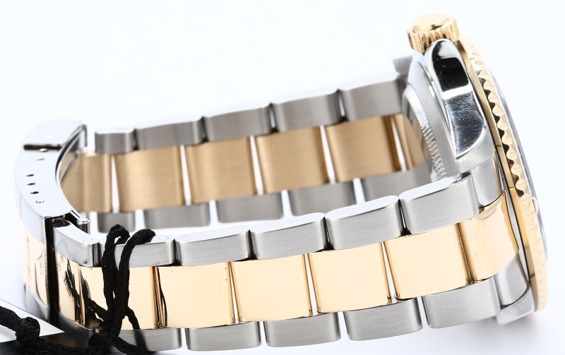 Rolex Submariner 16613T Champagne Serti Dial