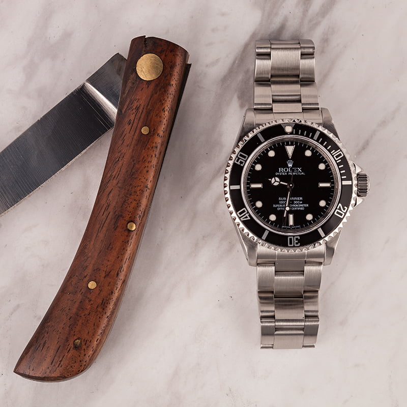 Used Rolex Submariner 14060M Serial Engraved