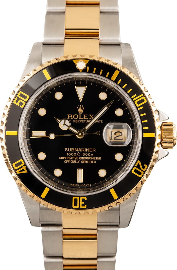 rolex gold and black watch