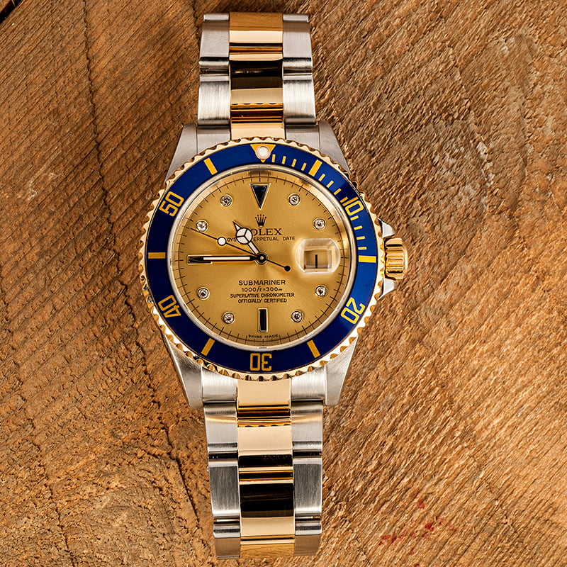 Rolex Submariner 16613T Champagne and Blue Serti