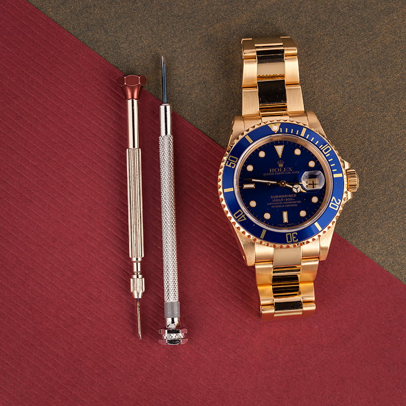 Pre-Owned Rolex Submariner 16618 - 18k Yellow Gold T