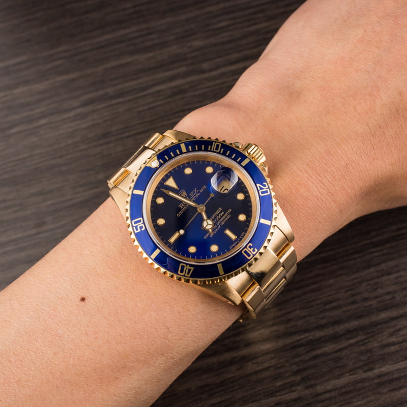 Pre Owned Rolex Submariner 16618 Blue Dial 18K Yellow Gold