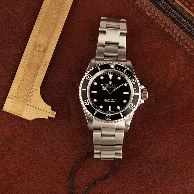 Pre-Owned Rolex Submariner 168000 Stainless Steel Watch
