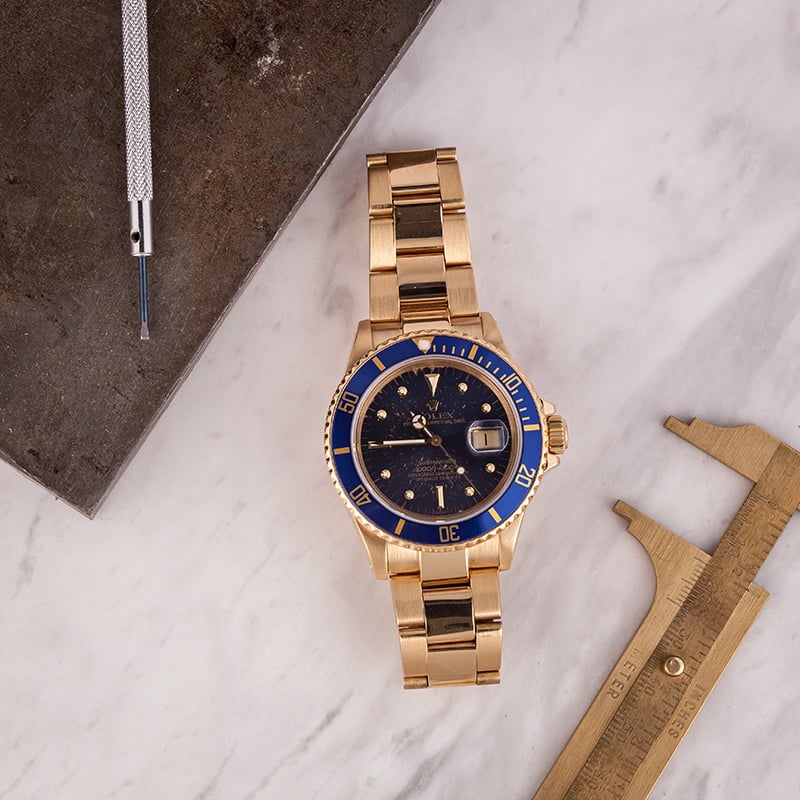 Rolex Submariner 16808 Yellow Gold Aged Blue Nipple Dial