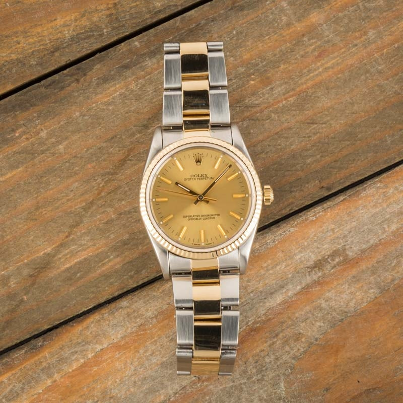 Pre-Owned Rolex Oyster Perpetual 14233 Champagne Dial