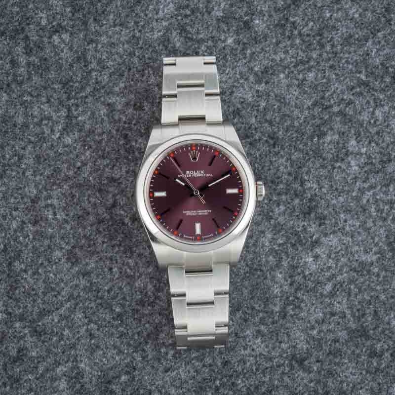 Rolex Oyster Perpetual 39MM Ref 114300 Red Grape Dial
