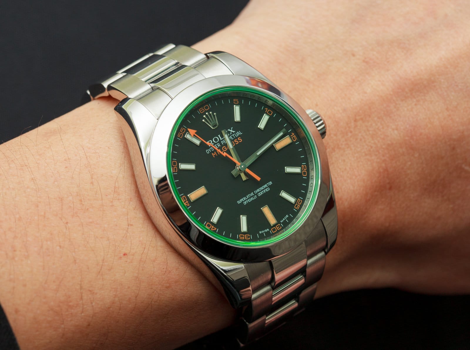 anniversary green crystal milgauss on wrist