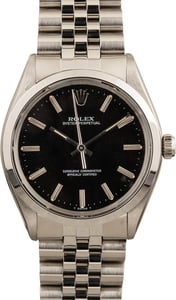 Rolex Oyster Perpetual 1002 Smooth Steel Bezel