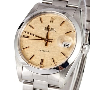 Rolex Oyster Date 6694 Champagne Linen Dial