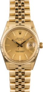 Pre-Owned Rolex Date 15037 Champagne Dial Gold Watch