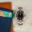 Pre-Owned 40MM Rolex Submariner 14060M Timing Bezel