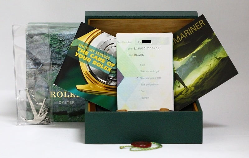 PreOwned Rolex Submariner 16613 Gold Thru Clasp