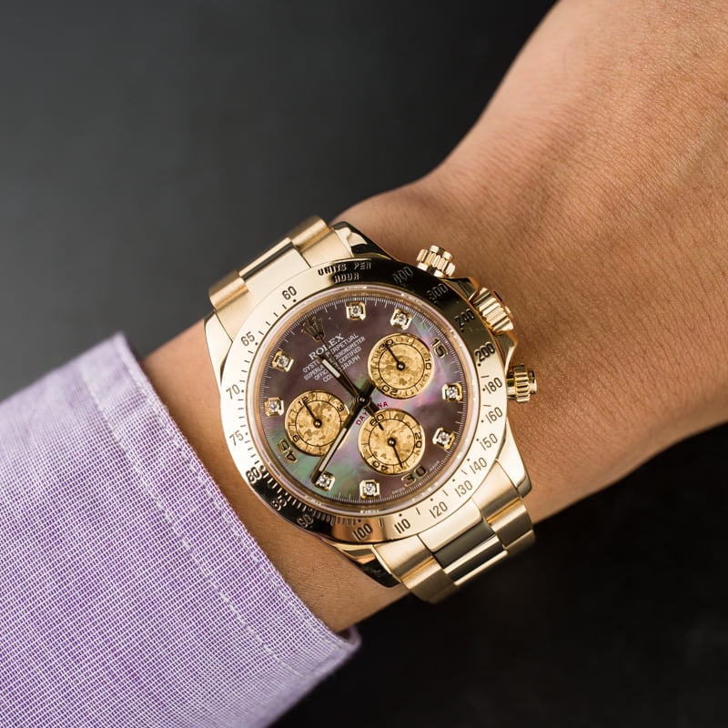 rolex daytona yellow gold mother of pearl