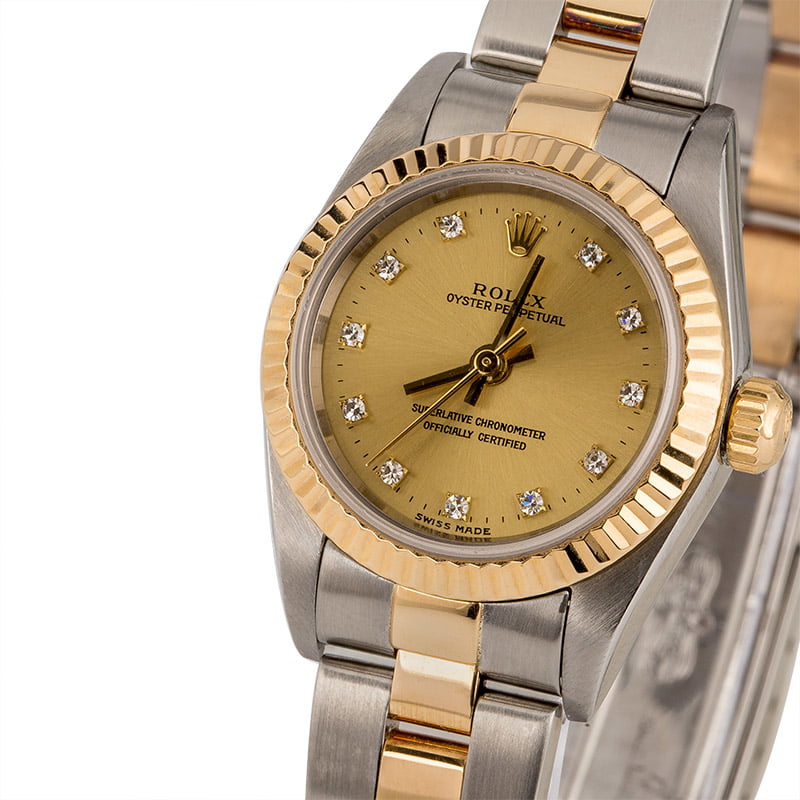 Rolex Oyster Perpetual 76193 Champagne Diamond Dial