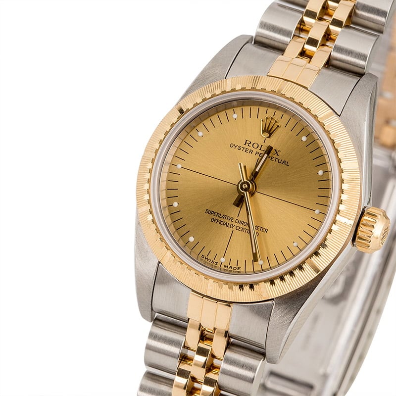 Rolex Oyster Perpetual 76243 Champagne Quadrant Dial