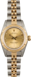 Rolex Oyster Perpetual 76243 Champagne Quadrant Dial