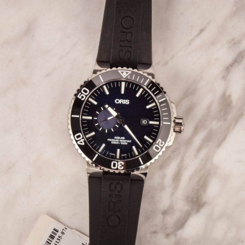 Aquis Small Second, Date Blue Dial & Black Rubber Strap