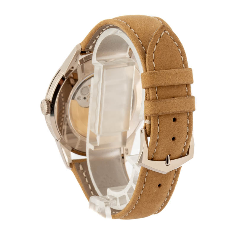 Patek Philippe Calatrava men's watch in 18k rose gold with a leather strap.