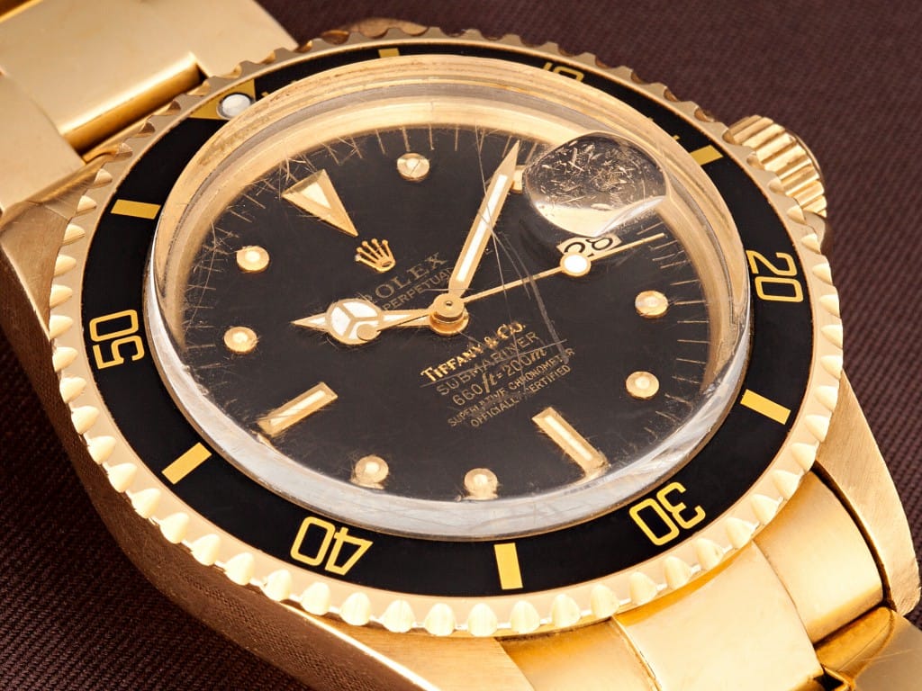 black dial gold rolex submariner tiffanys