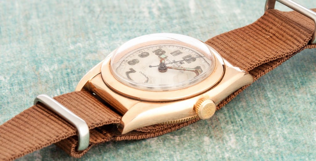 gold bubbleback with leather strap
