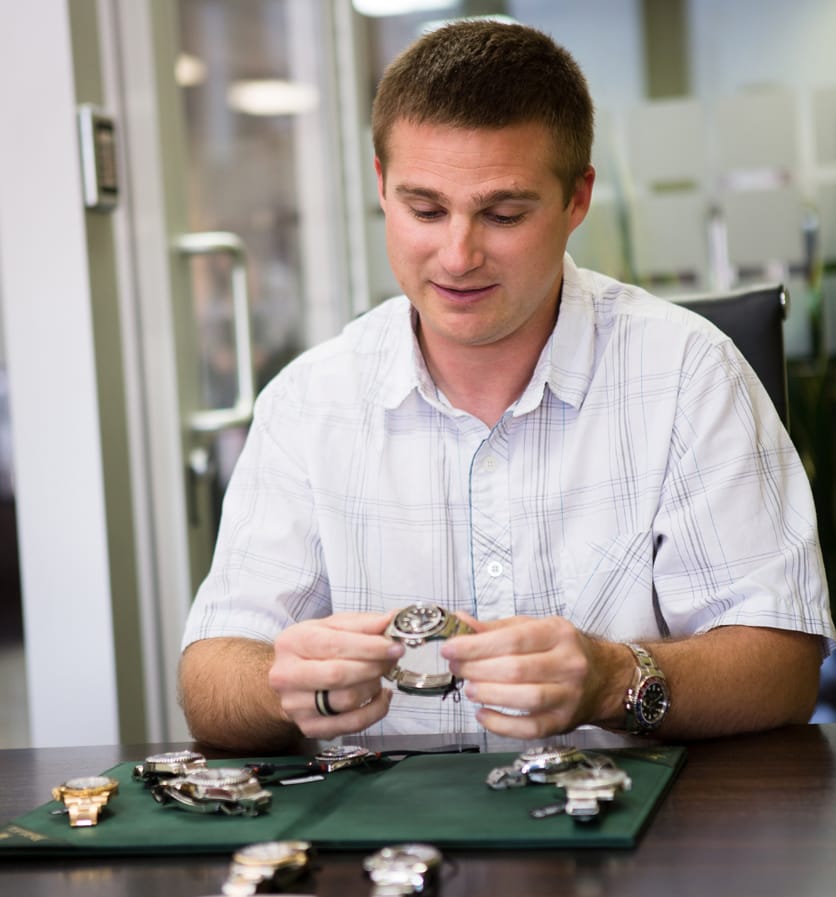 @rolexdiver holding a rolex submariner