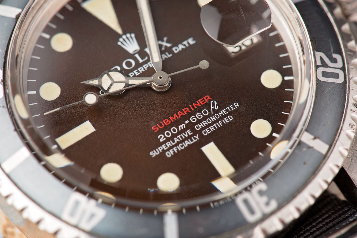 Rolex submariner sales tropical dial