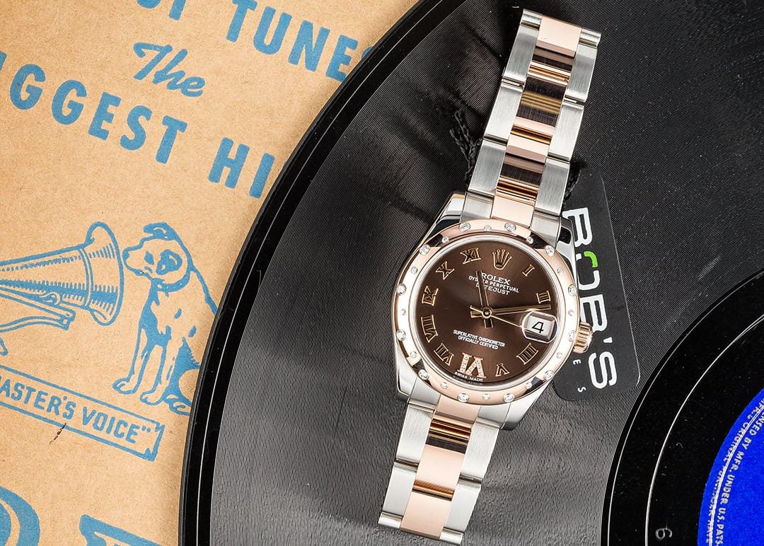 Role Datejust with Roman Numerals with a brown dial.