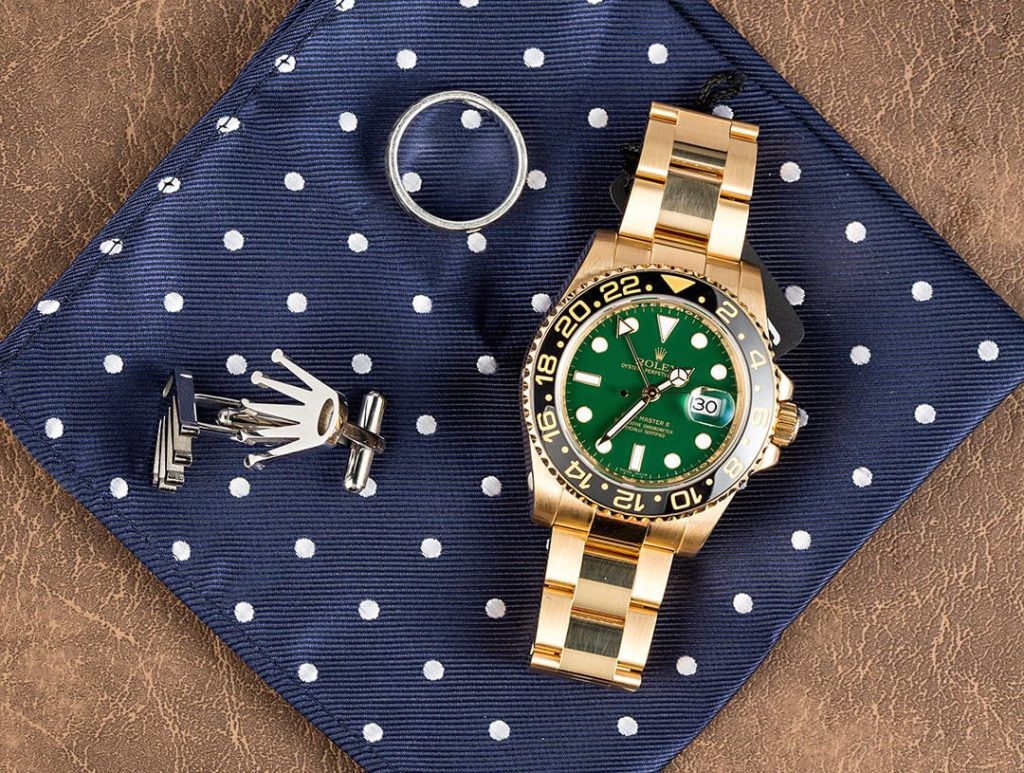This gold Rolex with a green dial is perfect for anyone to wear to Wimbledon. Green Rolex Watches