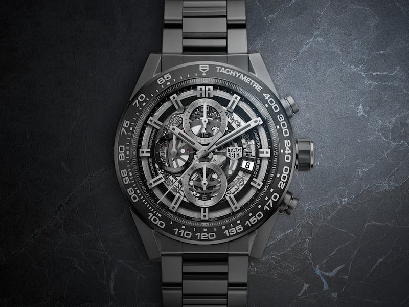 The TAG Heuer, the Carrera HEUER-01 comes with a tachymetre and is scratch resistant. The TAG Heuer, the Carrera HEUER-01 comes with a tachymetre and is scratch resistant.