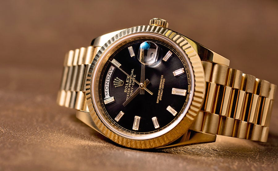 gold rolex day date black dial