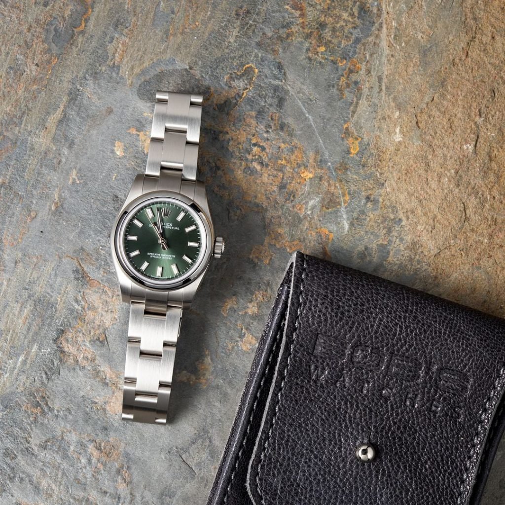 Here is a green ladies Oyster Perpetual watch. Green Rolex Watches