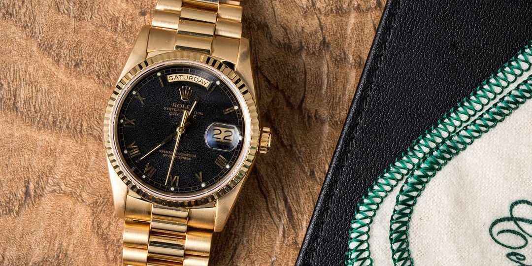 gold black face rolex