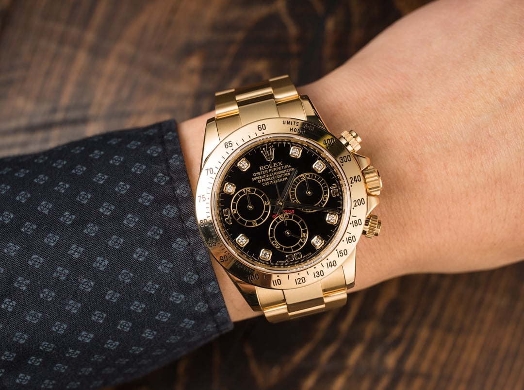 The Daytona 116528 is a great tool with, whether you want leather or bracelet is up to you. Eric Clapton has the Daytona 116528, but he wears it with an elastomer strap.