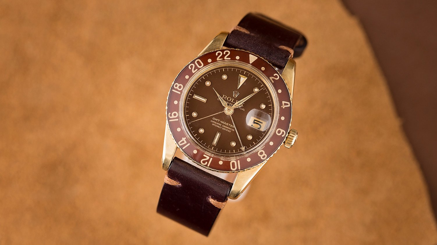 How watch auctions work vintage Rolex GMT-Master gold