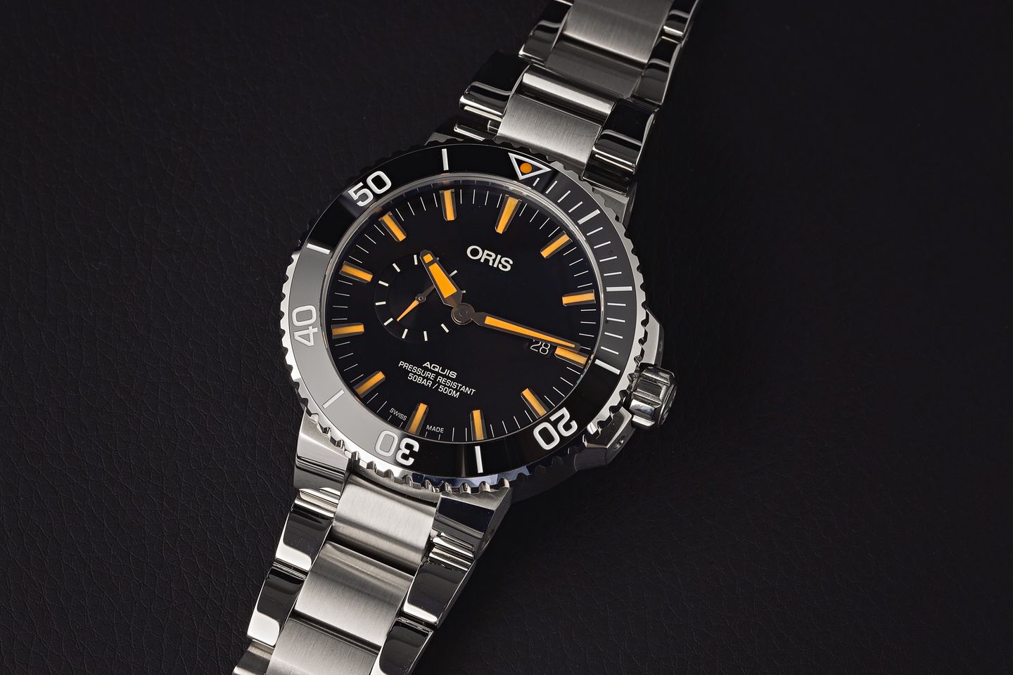 Oris Divers Sixty-Five versus Oris Aquis Comparison stainless steel bracelet