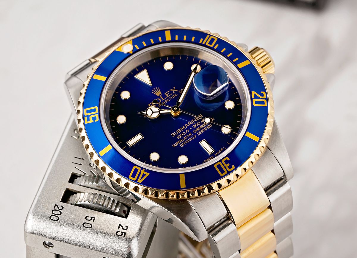 Rolex Submariner tham khảo. 16613 Rolex Submariner Blue 16613