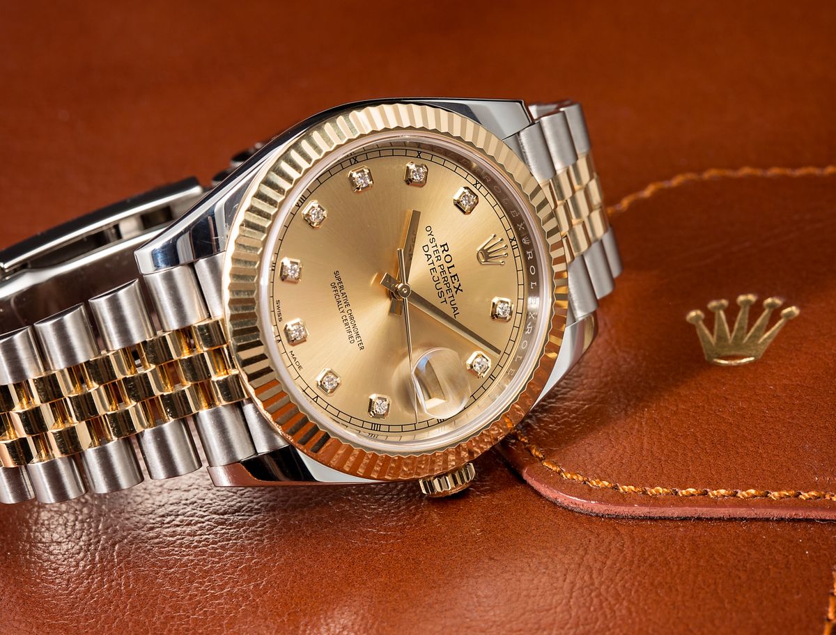 difference between rolex oyster perpetual date and datejust