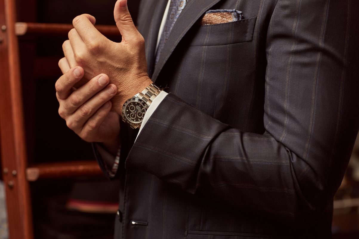 rolex submariner with a suit